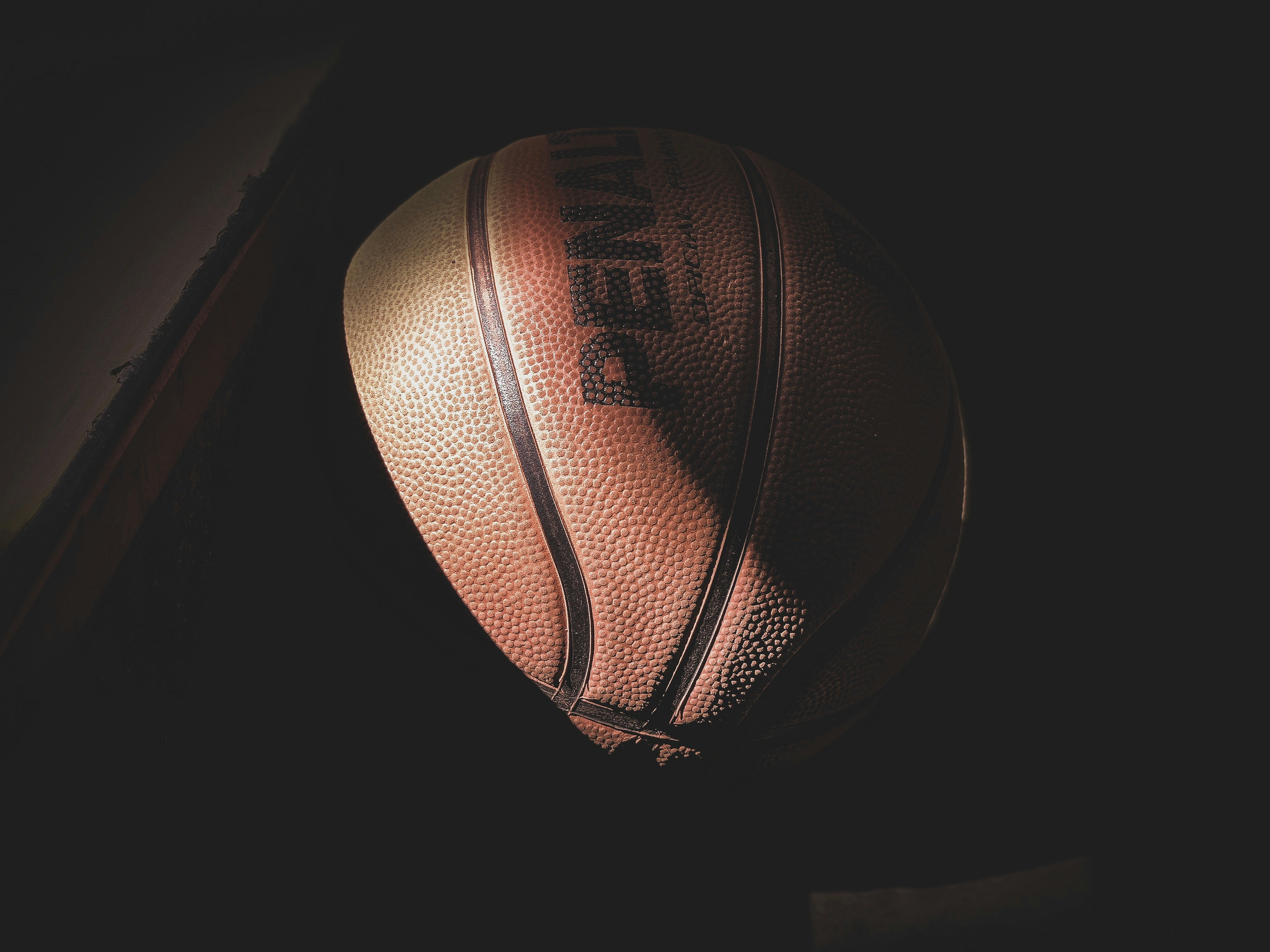 What Is The Process For Securing A Portable Backboard To Its Base?