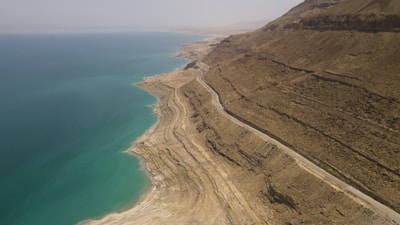 A panoramic view of the Red Sea coastline with crystal-clear waters and desert landscapes.
