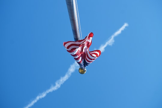 worm's-eye view photography of USA flag in pole in West Palm Beach United States