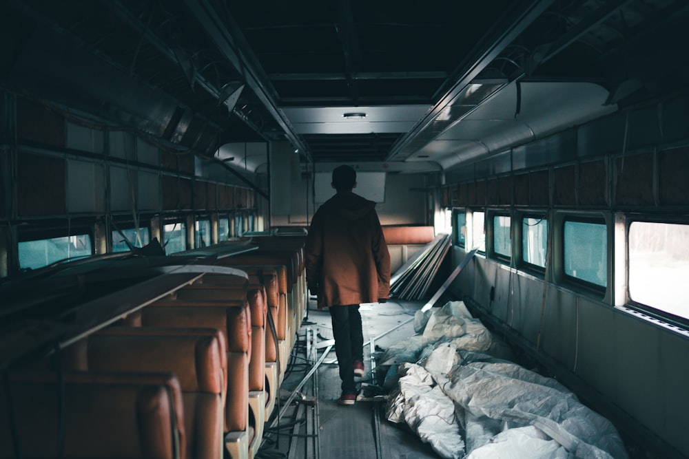 person walking inside train