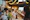 people raising wine glass in selective focus photography