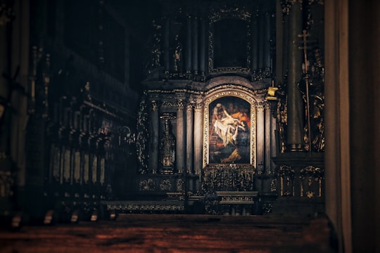 photo of brown and beige cathedral in Kalisz Poland