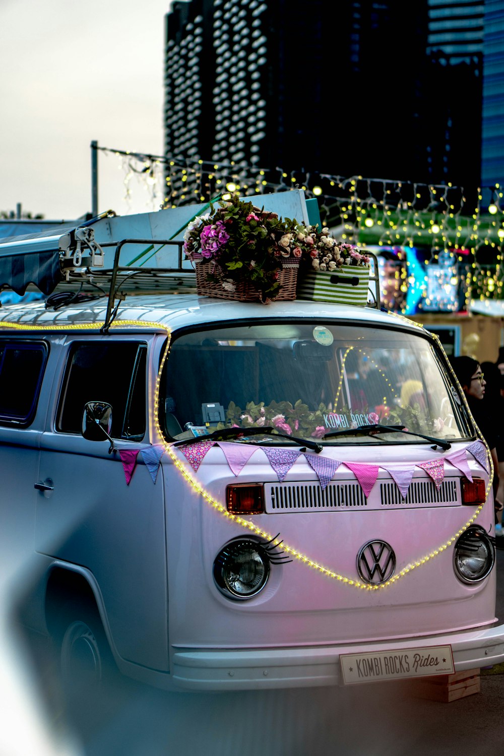 flowers on roof of Volkswagen Samba