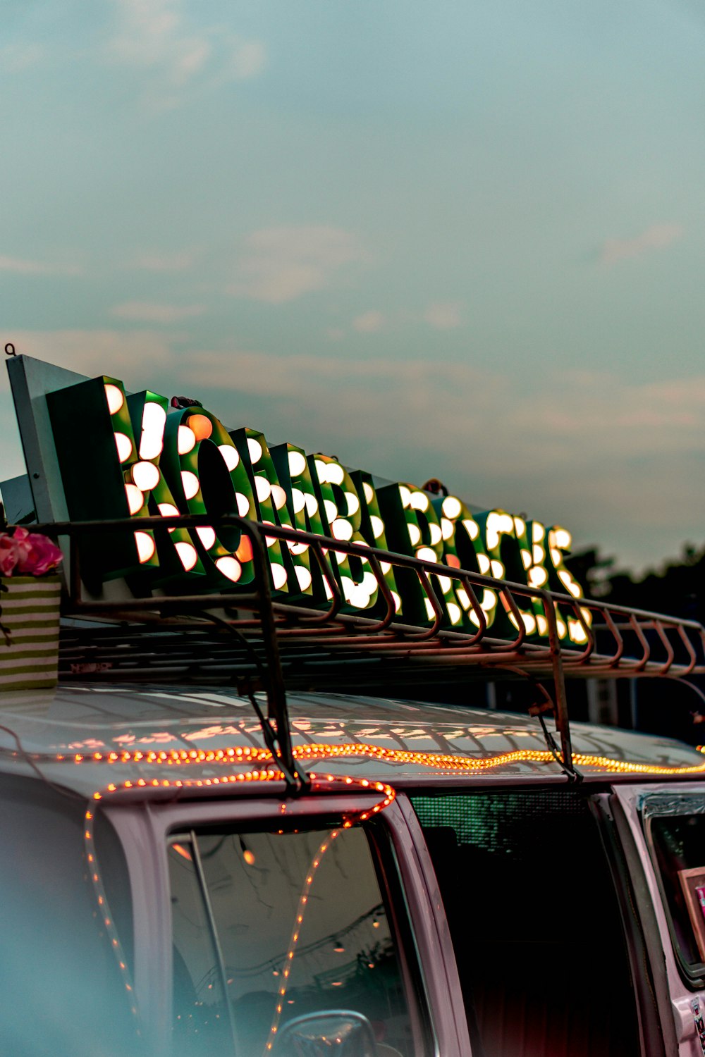 green and white Kombi rocks neon signage