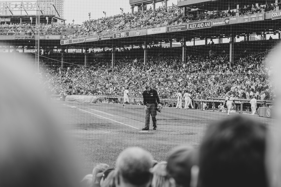 grayscale photography of people playing baseball,