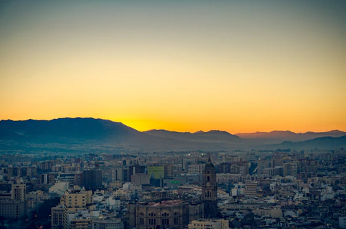 Panoramic view of Cuiabá city skyline at sunset.
