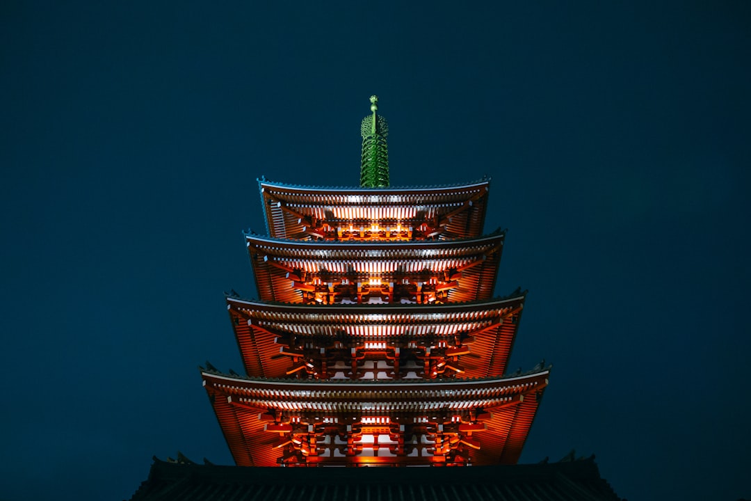 photo of red pagoda during nighttime