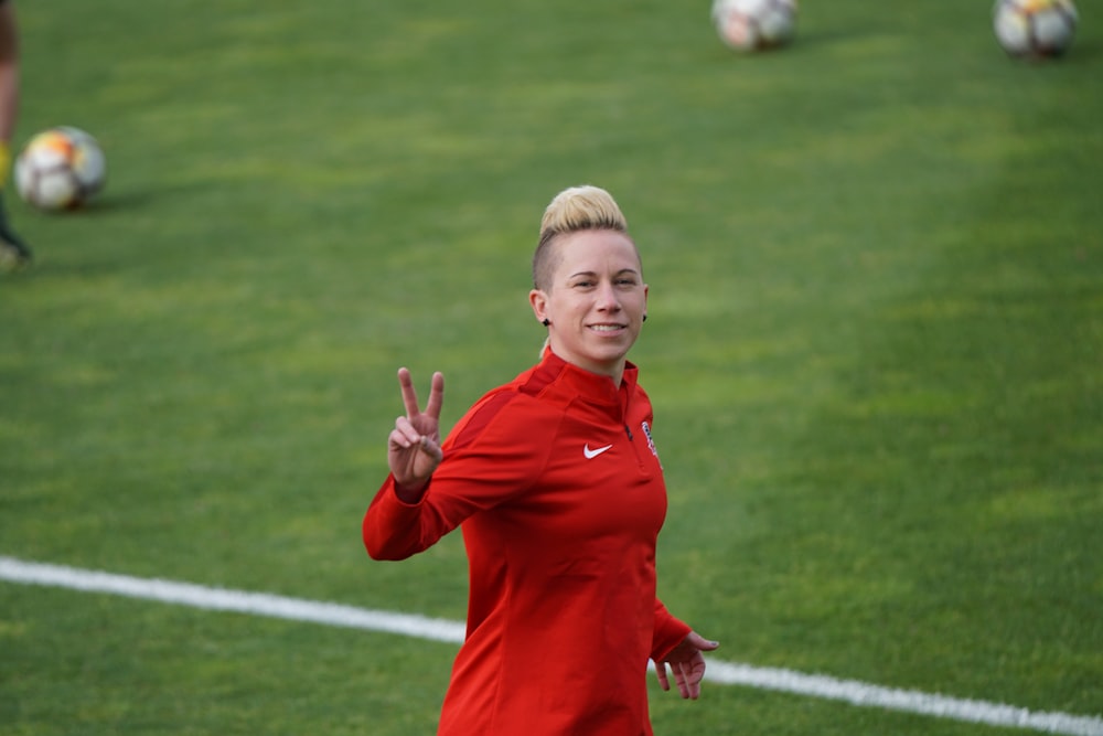 woman wearing red Nike shirt