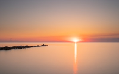 calm water during golden hour serene google meet background