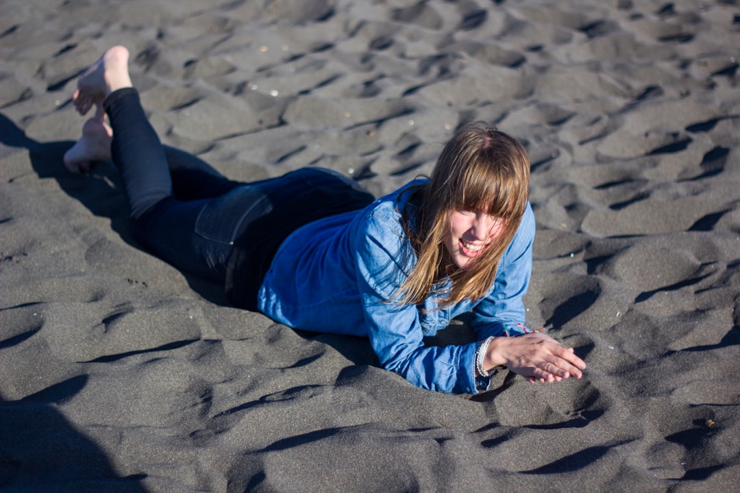 She is my friend Mathilde from France. We do this journey to Pichilemu beach with friends, and she just fall down the sand and enjoy the moment.
