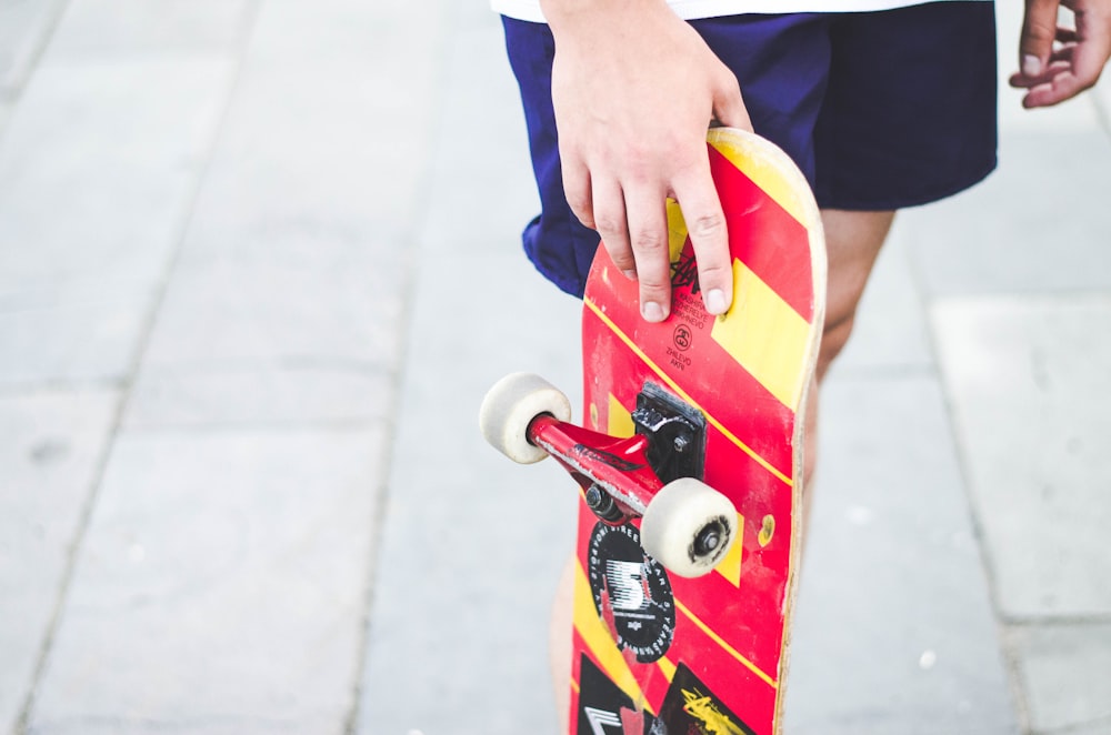 person holding skateboard