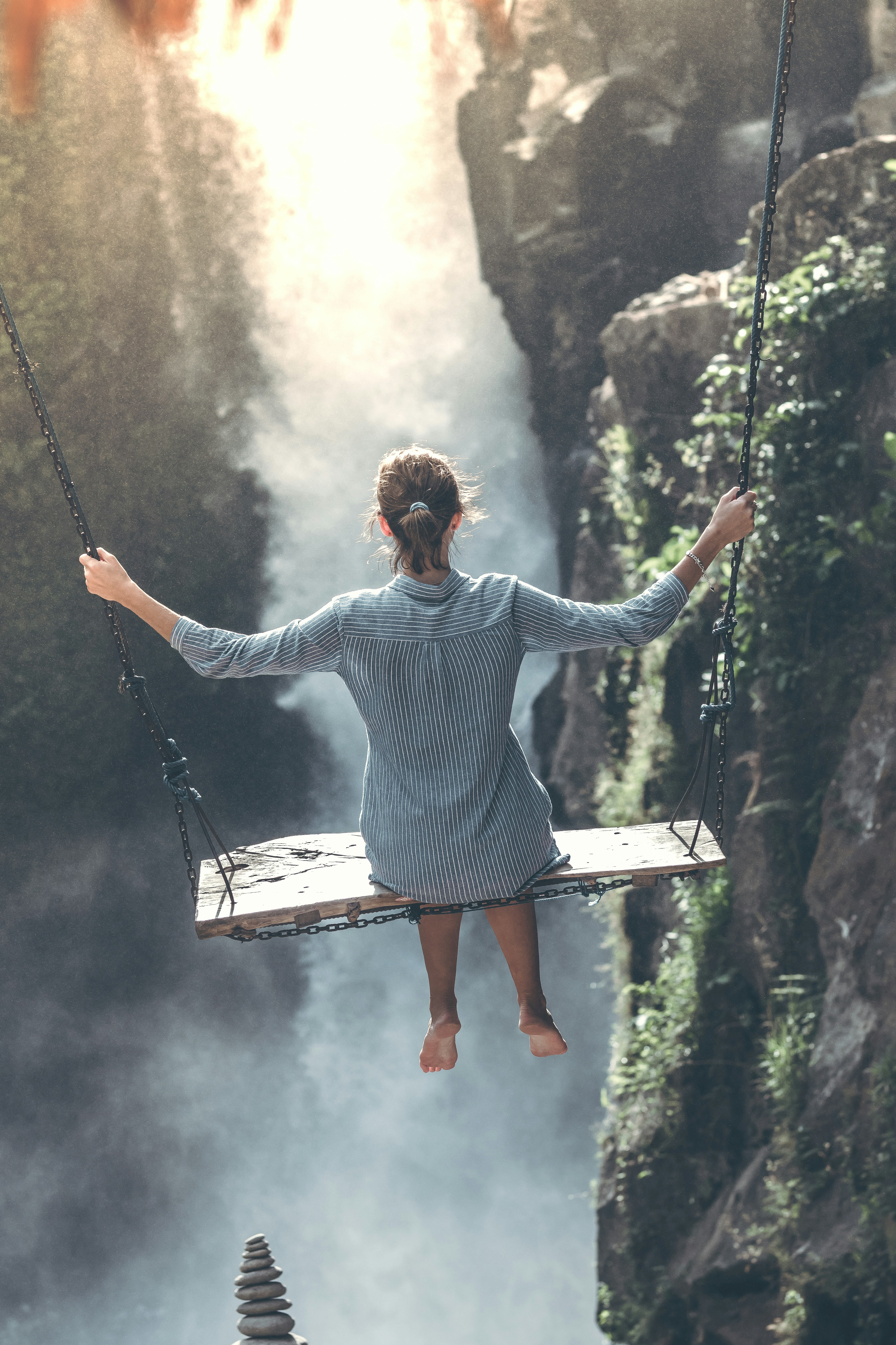 &quot;Beautiful woman swings near waterfall&quot;