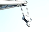 A close-up of a tow truck hook ready for action.