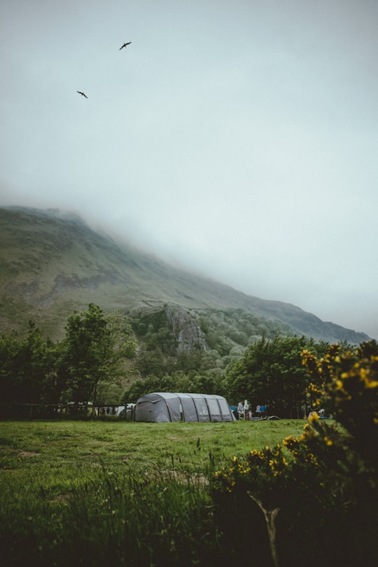 gray tent near mountain in Wales United Kingdom