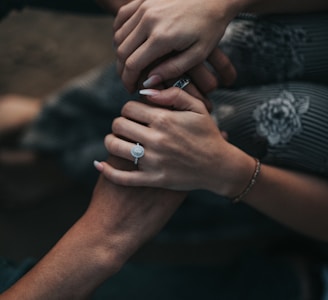 man and woman holding each others hands