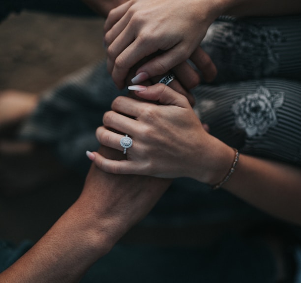 man and woman holding each others hands