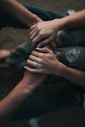 man and woman holding each others hands