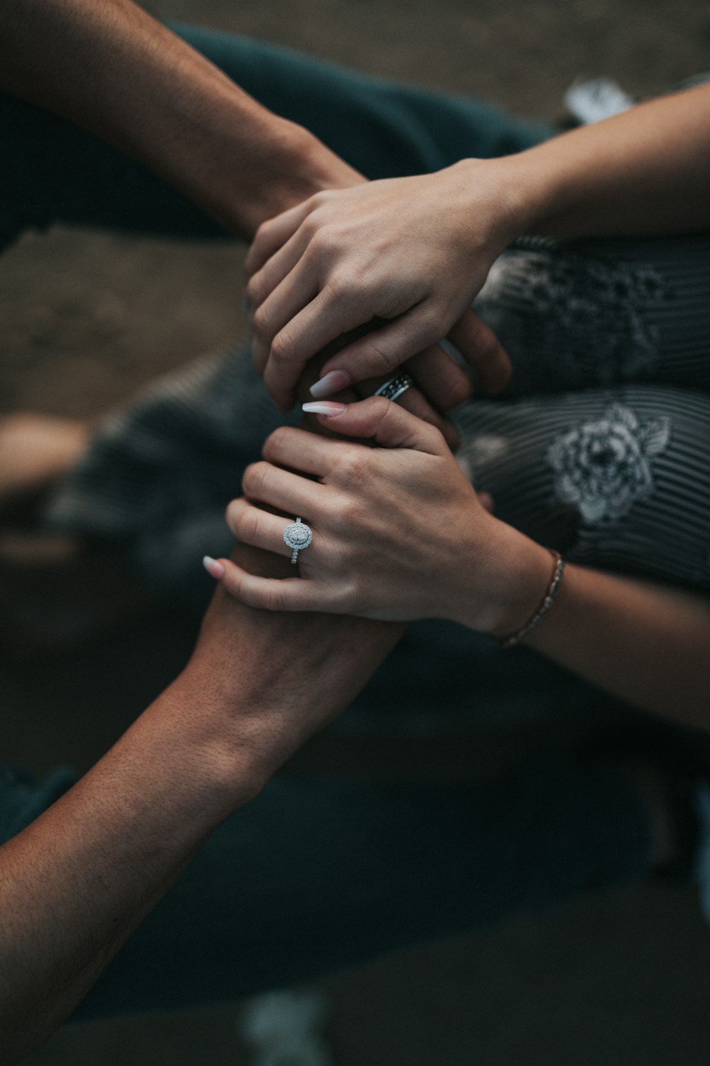 man and woman holding each others hands