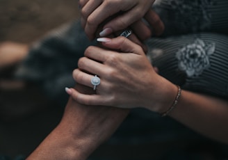 man and woman holding each others hands