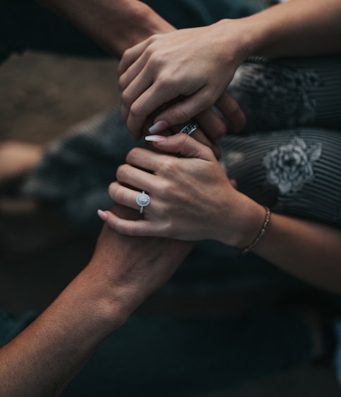 man and woman holding each others hands