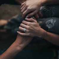 man and woman holding each others hands