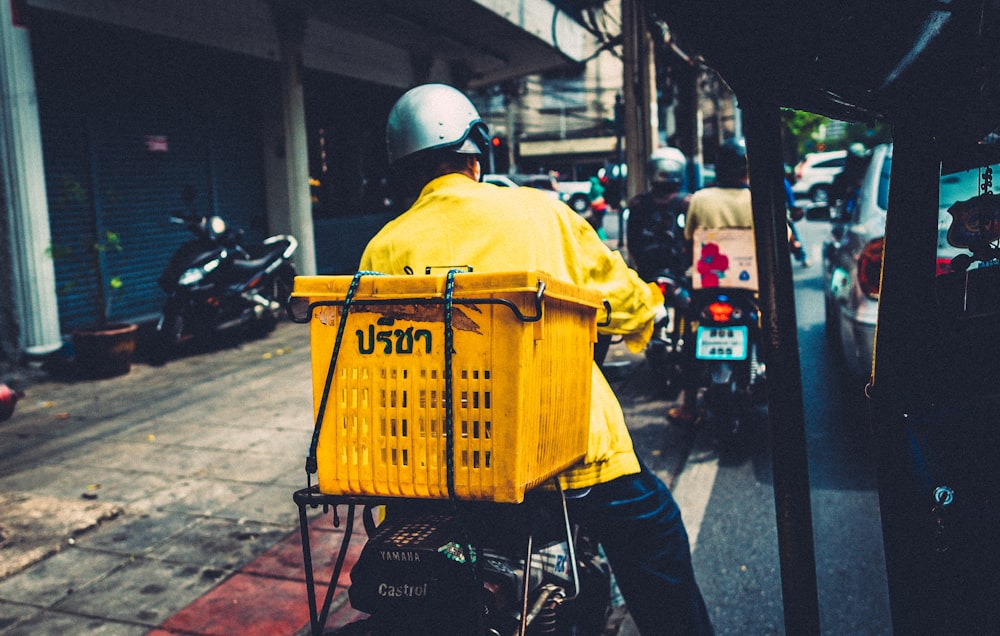 man riding motorcycle