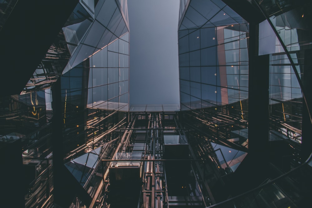 low angle photography of mirrored building