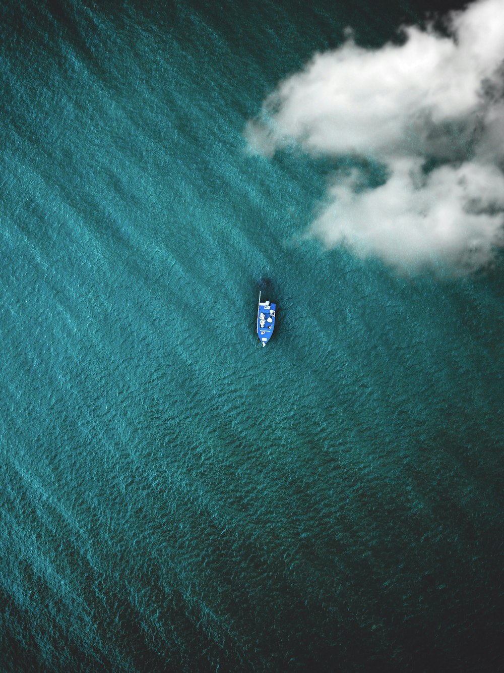 top view photo of boat on body of water