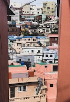 An outdoor view of a vibrant neighborhood with electrical lines.