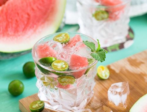 sliced watermelon with lemon on shot glass