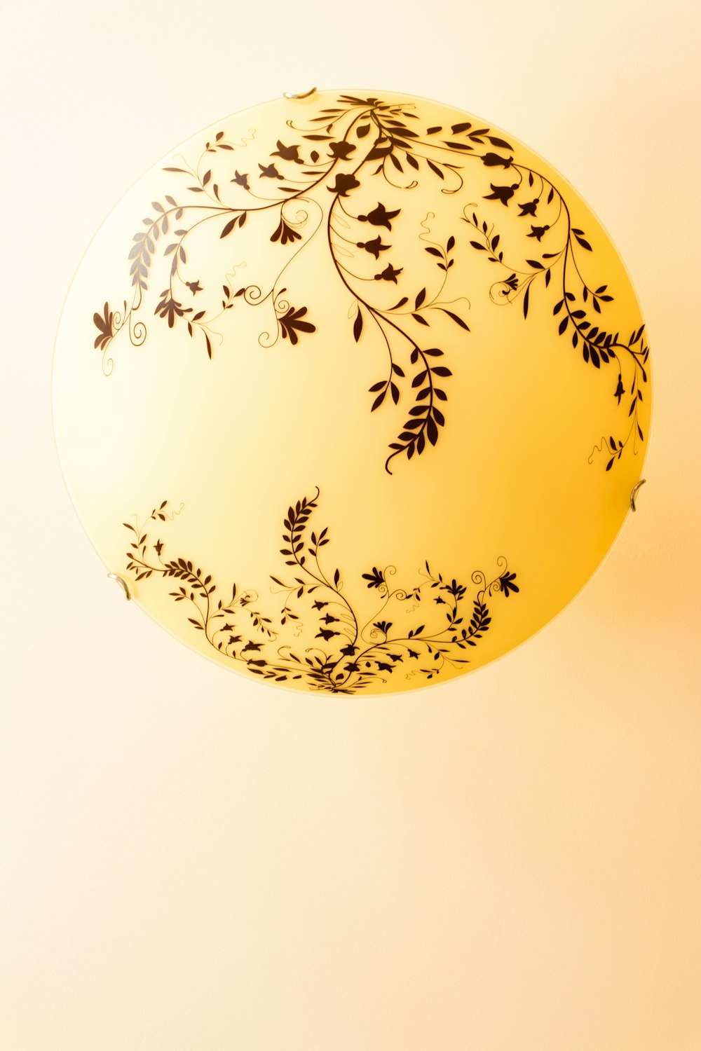 round yellow and black ornament