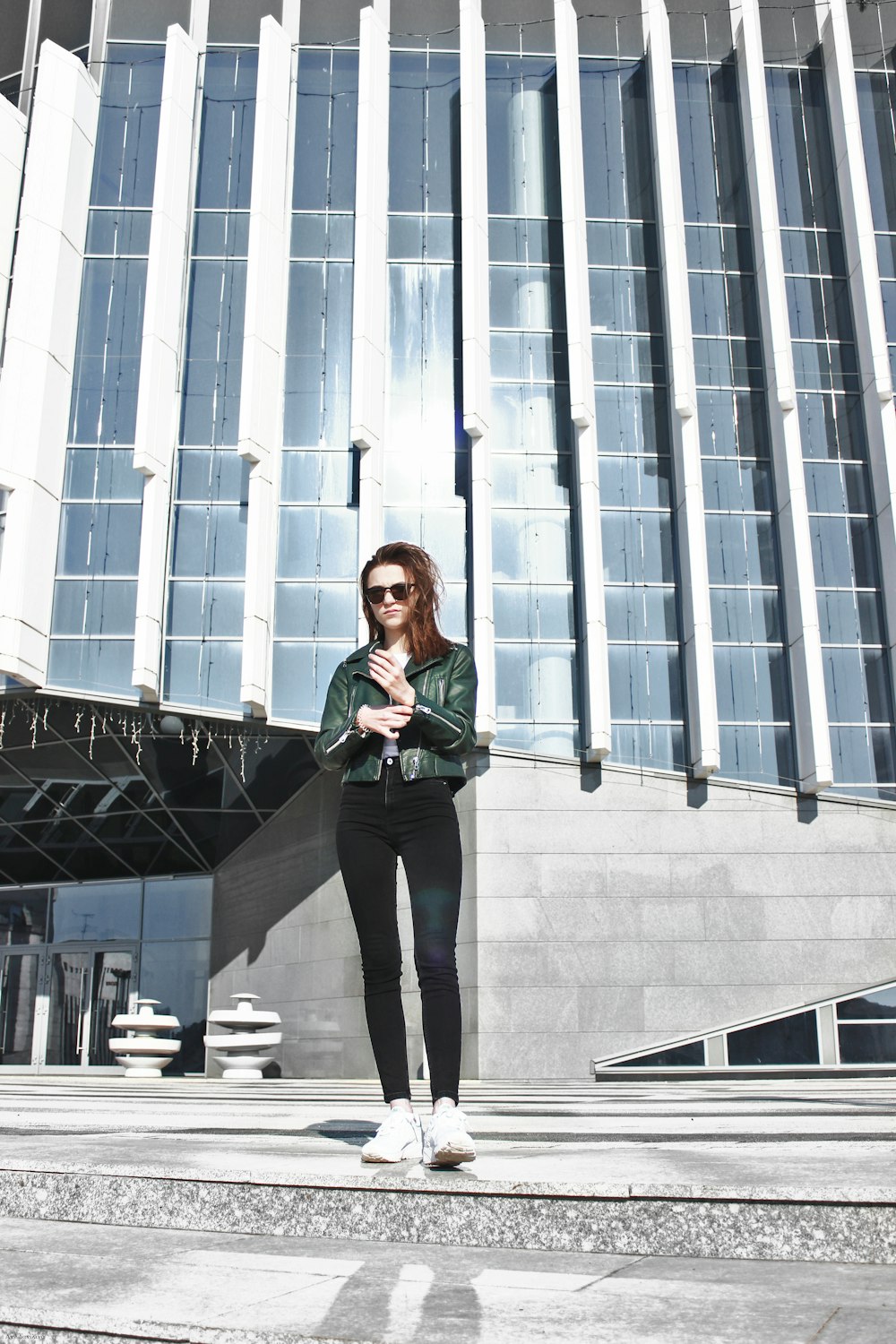 woman standing in front of building