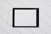 black drawing tab on white table