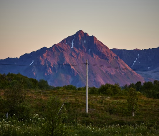 view of street post and mountain in Krøttøya Norway