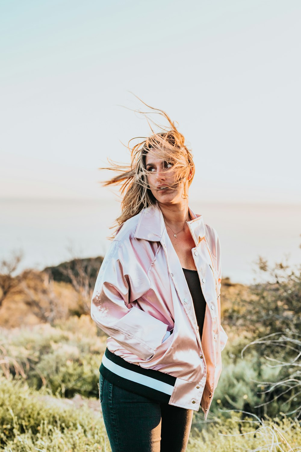 woman wearing brown button-up jacket