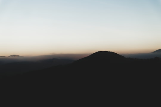 silhouette photo of mountain in Coubon France