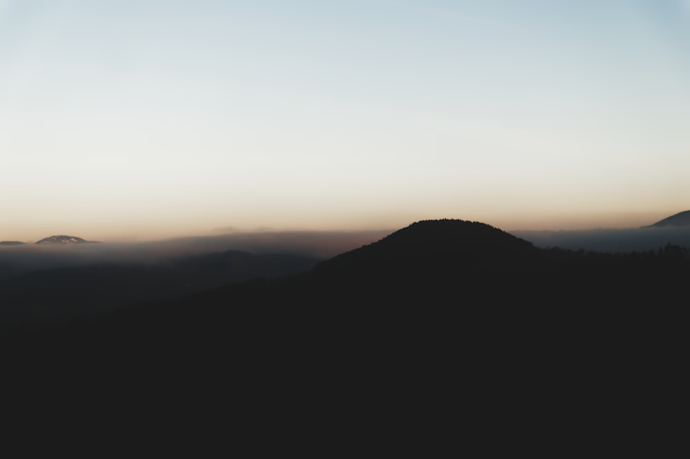 silhouette photo of mountain