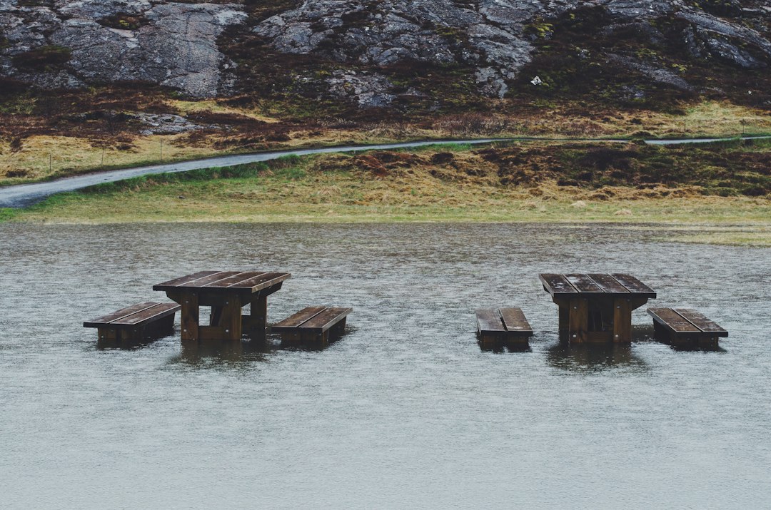 brown wooden table covered on body of water, A stop over in Þingvellir