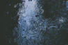 photo of body of water and droplets