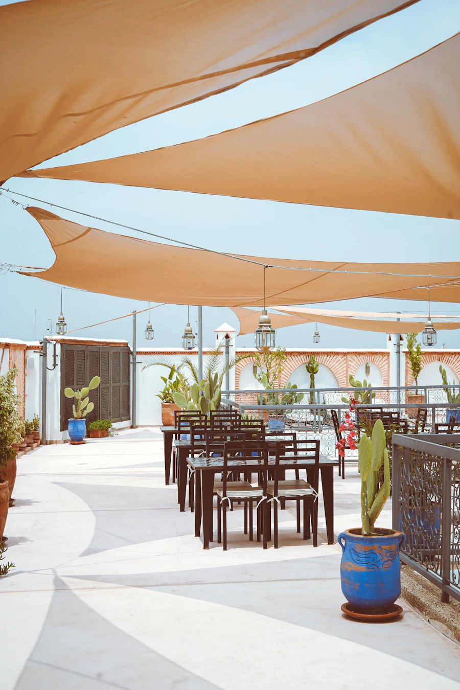 Rooftop terrace with a wooden dining table
