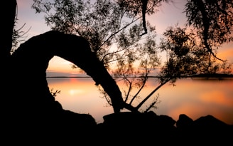 A captivating landscape photograph showcasing vibrant colors during sunset over a serene lake.