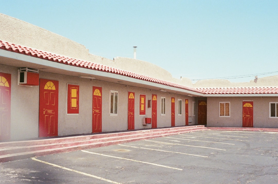 closed red wooden doors, A number of run-down motels in Las Vegas are slowly being shut down and possibly going to be to