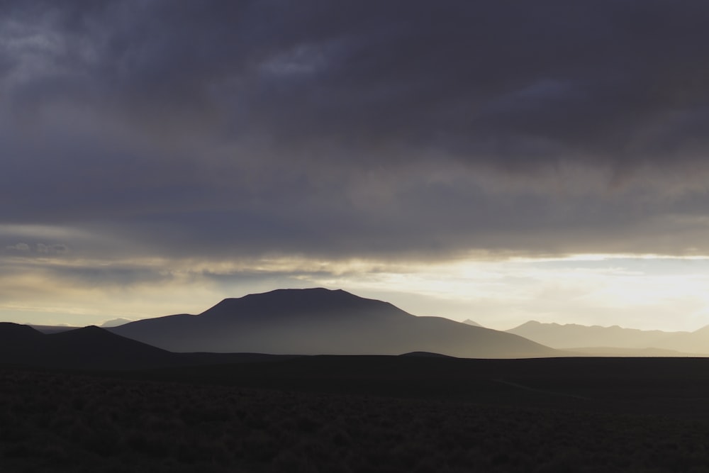 mountain under clouds