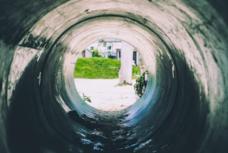 Professional technician inspecting a clean pipe with a high-tech camera.
