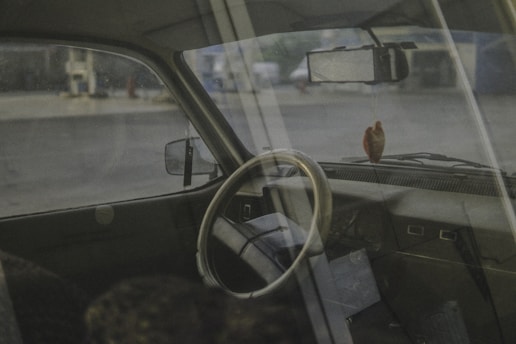 A serene travel scene featuring a peaceful car interior with calming decor.