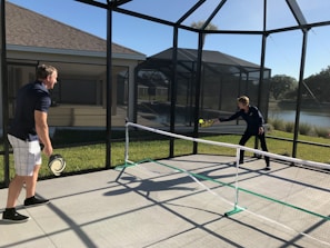 A pickleball match highlighting community engagement.