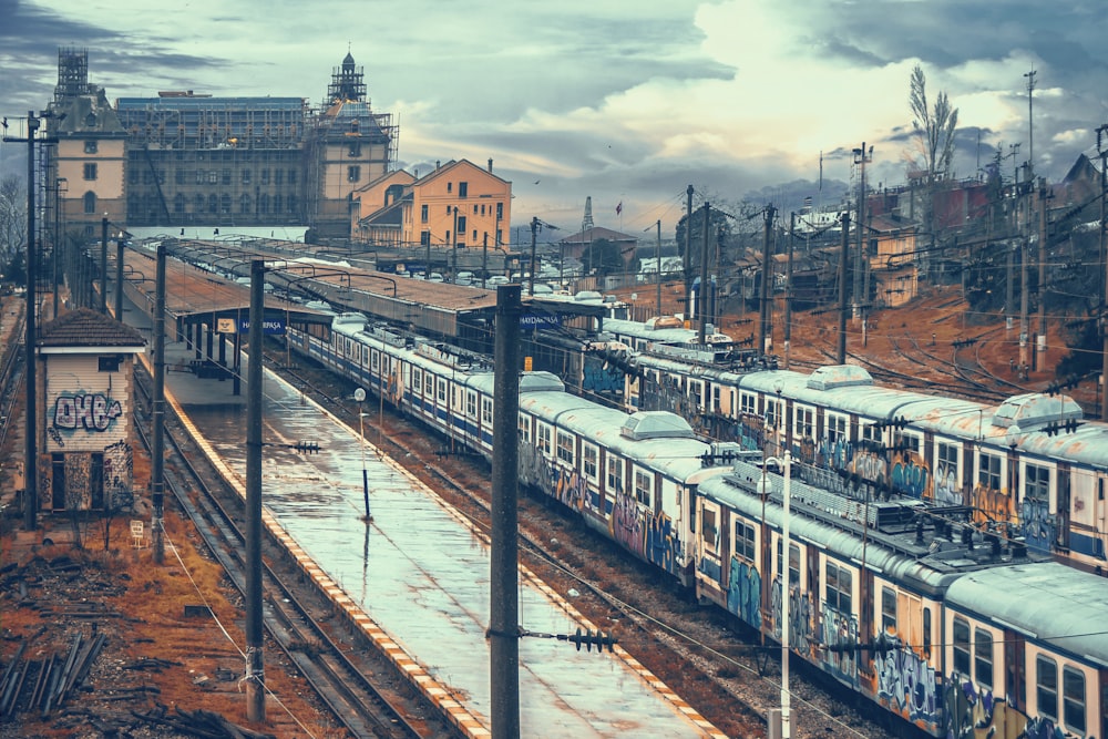 train on railway during daytime