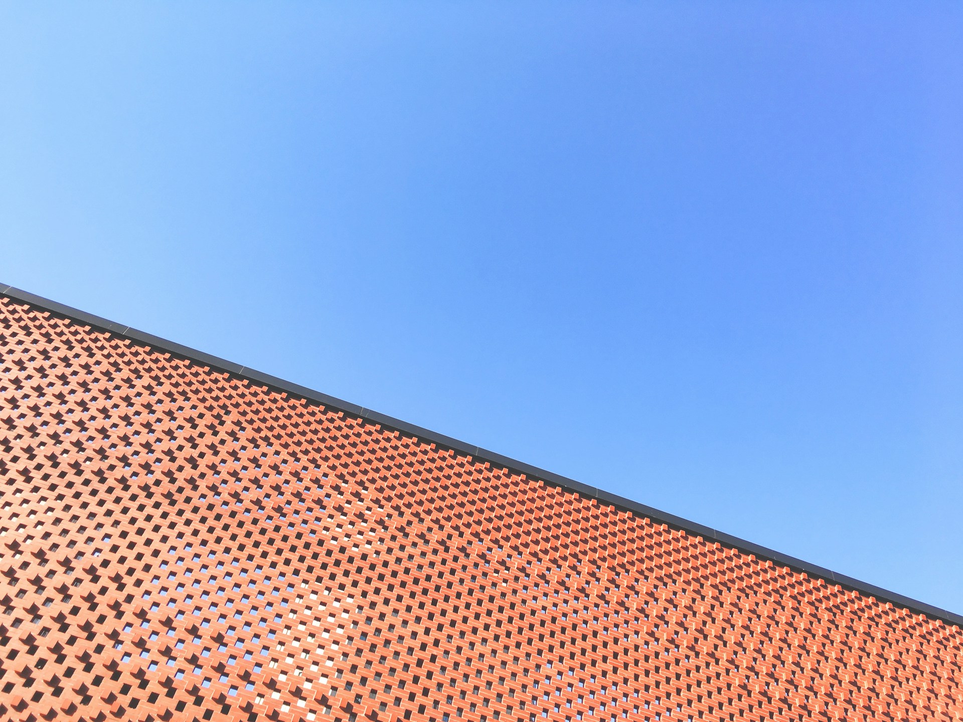 black and brown leather padded tub sofa