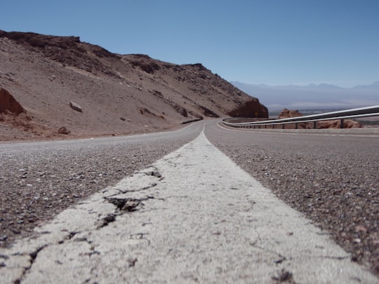 concrete road on the edge of mountain in San Pedro de Atacama Chile