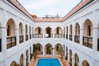pool on the middle of 2-storey building